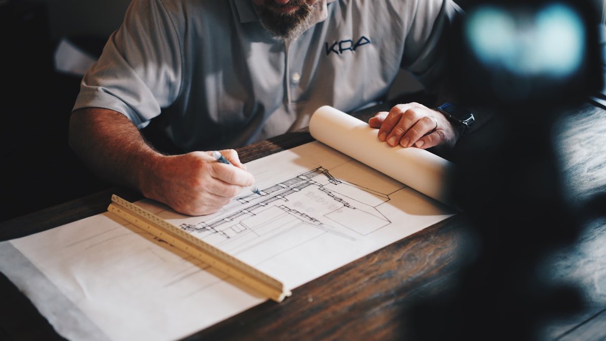 Drawings and a scale rule on a working desk