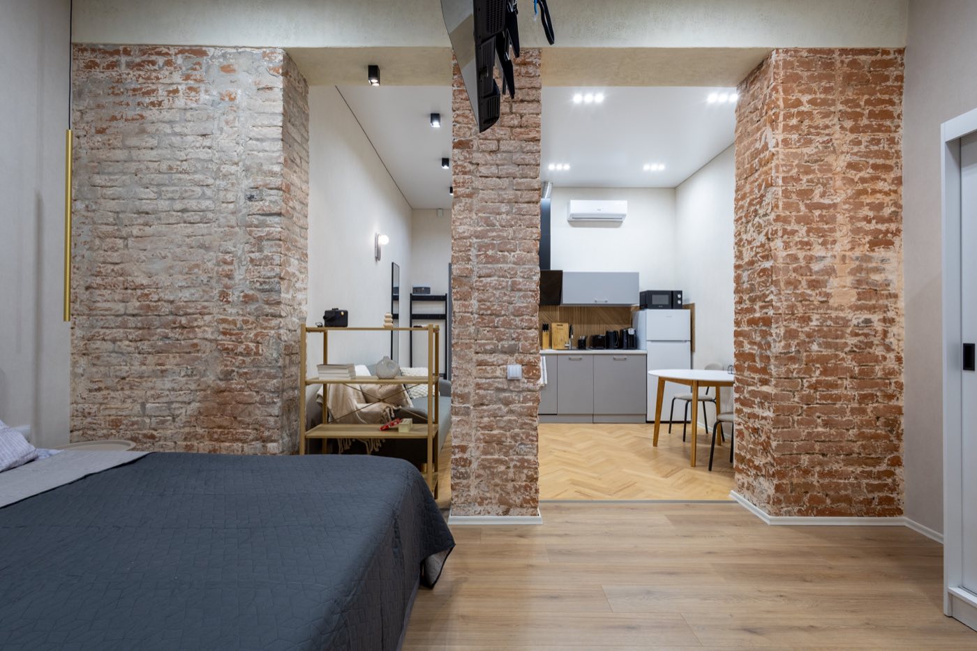 Studio apartment with exposed brick at VeraNest, Vera district, Tbilisi
